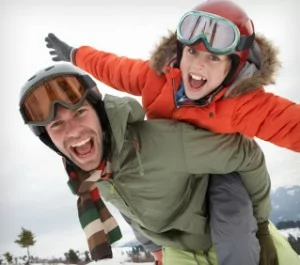 A man and child enjoying the outdoors, elevating the risk of chipped teeth.