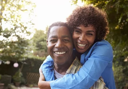 older couple hugging