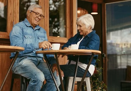 senior couple having conversation at cafe