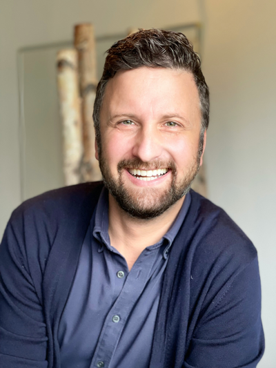 Smiling adult man with great teeth received dental implants in Dayton, OH